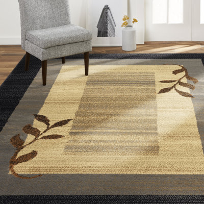 Tapis géométrique noir / brun
