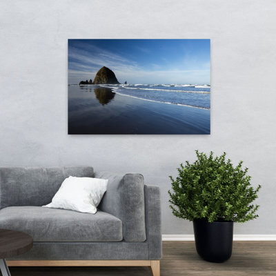 View Of Rock Formations Close To Coastline Cannon Beach Oregon USA by Dan Merkel - Wrapped Canvas Print