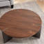 Table basse en bois de noyer de forme ronde - Pieds en métal noir, surface décorative vieillie brun foncé avec plateau et pieds pour le style