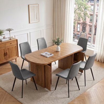 7‑Piece Oval Fixed Dining Set with Upholstered Chairs