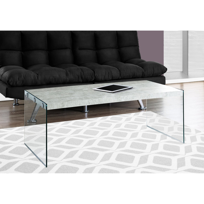 Table basse rectangulaire décorative grise avec plateau en verre trempé de 44 po de diamètre, créant une ambiance moderne