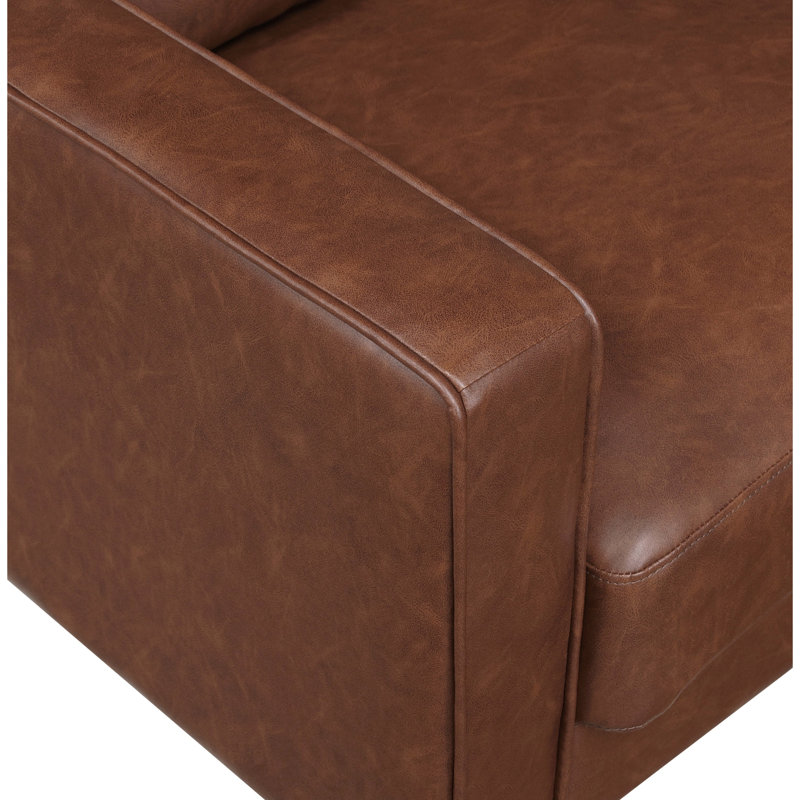 Sofa rustique deux places en similicuir au chocolat, avec accoudoirs droits et passepoil décoratif.