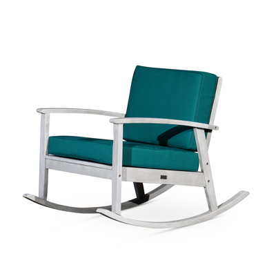 Chaise berçante en eucalyptus avec coussins foncés, gris argenté pour zone de détente extérieure