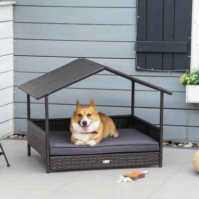 Niche pour chien en rotin avec coussin imperméable PawHut Wicker