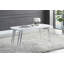 Table basse blanche et chrome