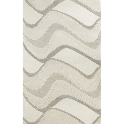 Tapis décoratif ivoire touffeté à la main à vagues abstraites