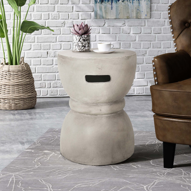 Table d'appoint contemporaine en béton léger avec design de sablier pour une utilisation extérieure et intérieure