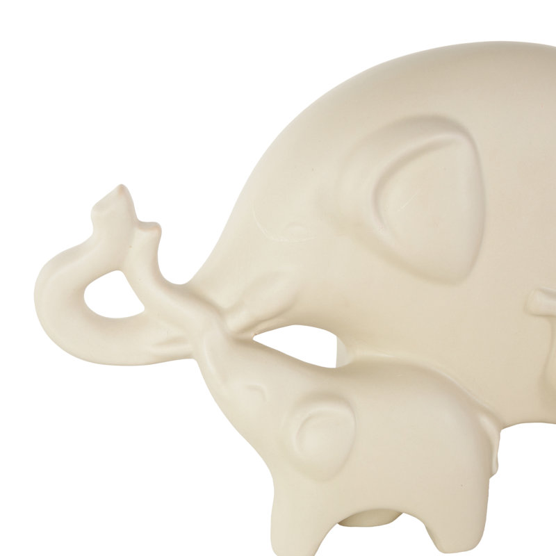Sculpture en céramique de famille d'éléphants en crème avec troncs surélevés