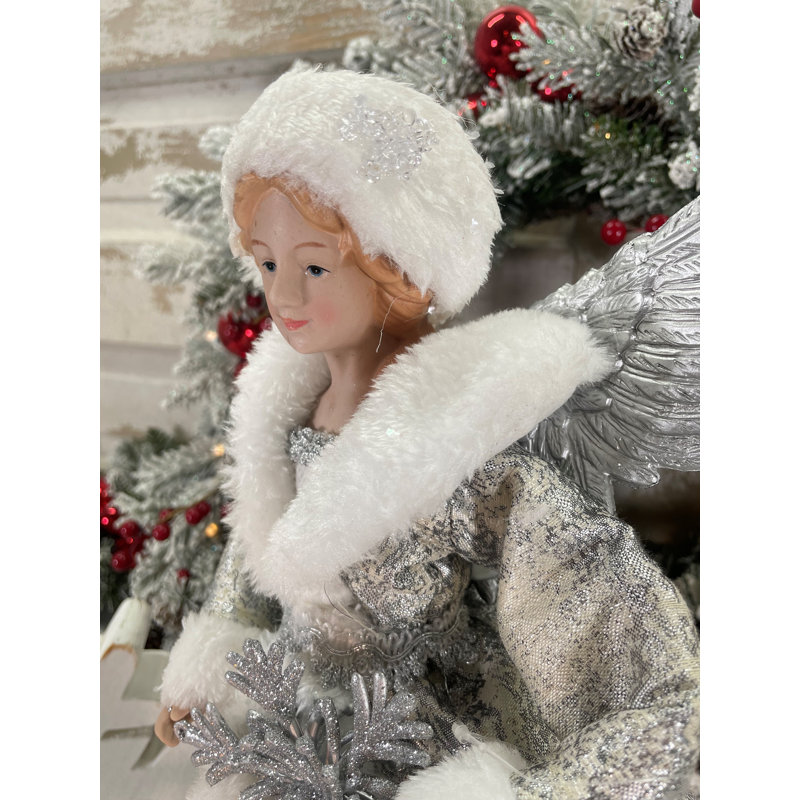 Ange hivernal avec flocon de neige blanc argenté