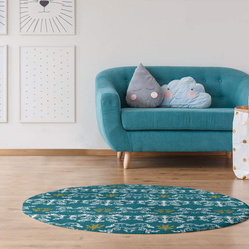 Tapis rond bleu damassé à motif baroque