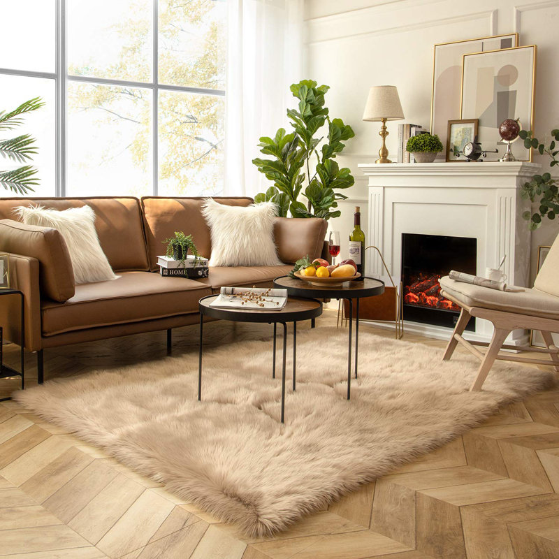 Blakes Solid Color Handmade Faux Sheepskin Area Rug in Beige, Rectangle 5' x 6'6"