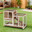 Cage à lapin surélevée en bois avec cage fermée, roues, rampe et plateau amovible, brun