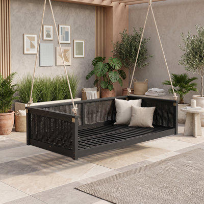 Lit simple en rotin en bois d'acacia et lit de jour suspendu à l'extérieur avec cordes en chanvre