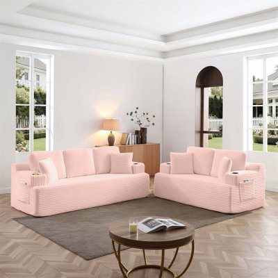 Canapé à compression avec porte-gobelets et poches latérales Revêtement en velours côtelé doux, conception sans assemblage pour les espaces de vie compacts.