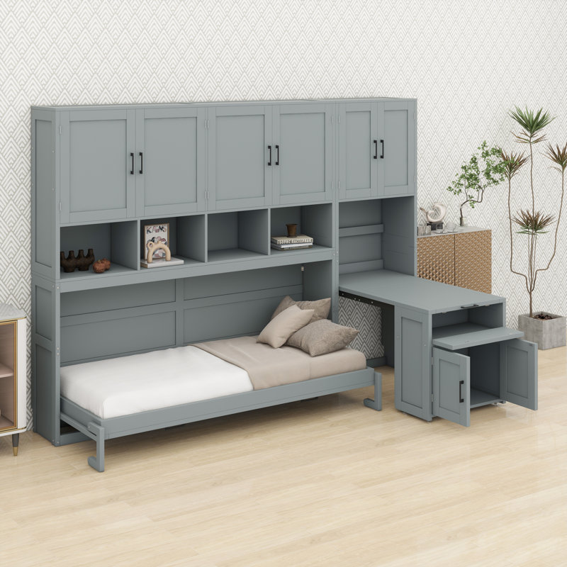 Lit escamotable peu encombrant avec armoire intégrée, tablettes ouvertes et bureau intégré