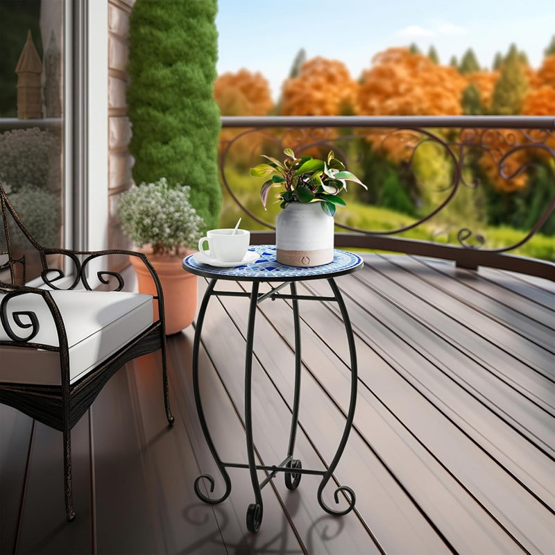 Table d'appoint ronde ronde avec volutes en métal et plateau en céramique