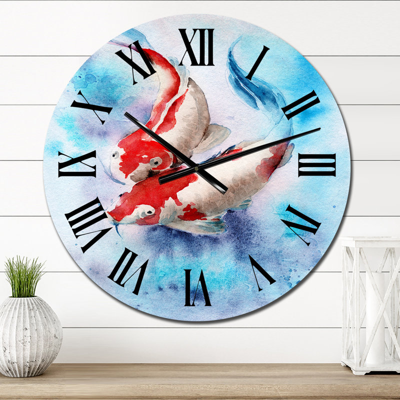 Deux poissons Koi. Taches rouges dans une eau bleue transparente - horloge murale nautique et côtière, Petit