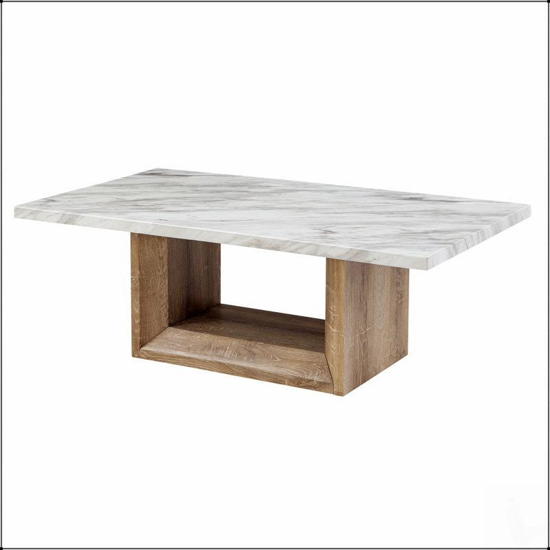 Table basse luxueuse à finition marbrée, parfaite pour ajouter de l'élégance et du style au décor de votre salon.