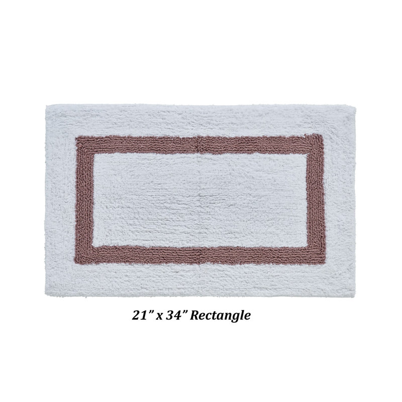 Tapis pour salle de bain réversible 100% coton Widman, doux et super absorbant, lavable à la machine pour la douche, la baignoire et le lavabo, rectangle 21 po x 34 po, blanc / rose