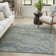 Tapis bleu abstrait en polyester Herickson