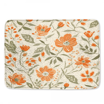 Tapis de bain orange à motif floral