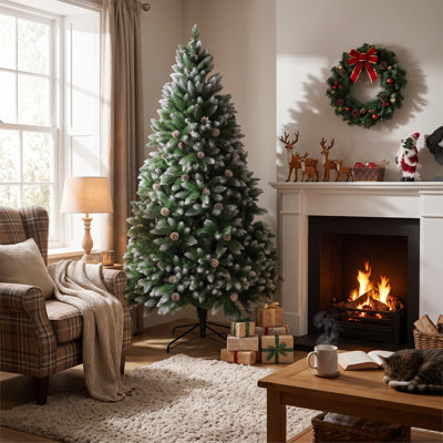 White Sprayed Christmas Tree With Pinecones