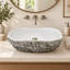Lavabo de salle de bain vasque ovale à surface solide 19 "avec extérieur en pierre ciselée en gris et blanc moucheté-135380574