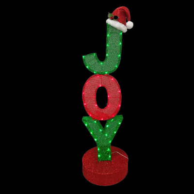 Figurine "JOY" avec chapeau de père Noël
