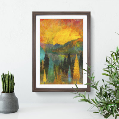 Sun Setting Behind an Autumn Forest - Framed Print