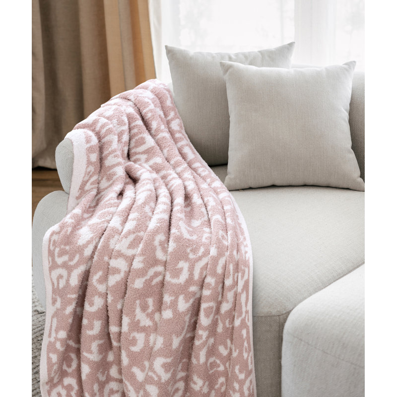 Jeté en plumes Leopard 50 po x 60 po, Rosé
