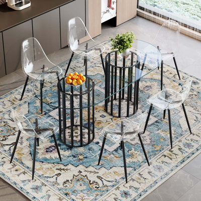 Ensemble de table de salle à manger de luxe en verre trempé ovale avec chaises transparentes