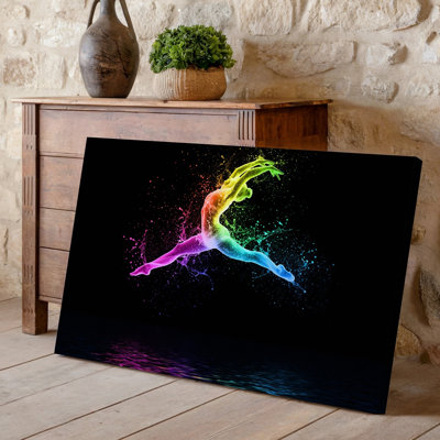 Canvas A Graceful Dancer Captured Mid Leap Her Form Appearing As Wall Art A Translucent Fluid Silhouette Surrounded By Vibrant Canvas Wall Art