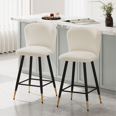 Tabouret de bar de style moderne de 25,79 po avec sièges blancs, pieds en métal noir et extrémités dorées, convenant à divers styles de décoration