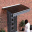 Auvent de porte - 47 po x 34 po. Toit en polycarbonate. Rouille - Supports. Chauffer. Extérieur. Auvent brun foncé avec vent profond de 34 po