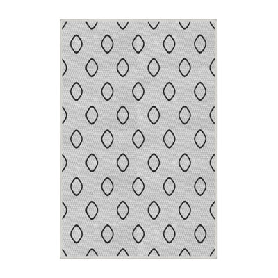 Tapis blanc/noir à motifs