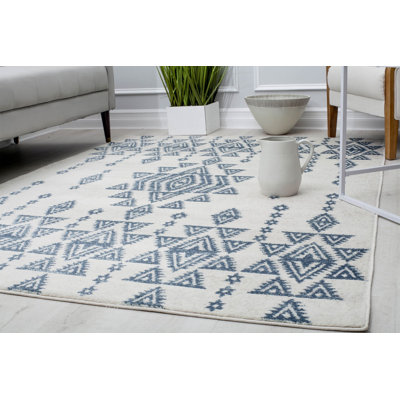 Jhaniyah Geometric Blue/Ivory Area Rug