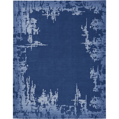 Tapis bleu abstrait en polyester touffeté à la main