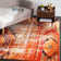 Hertzler Southwestern Orange Area Rug