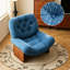 Fauteuil lounge bleu au design moderne et épuré