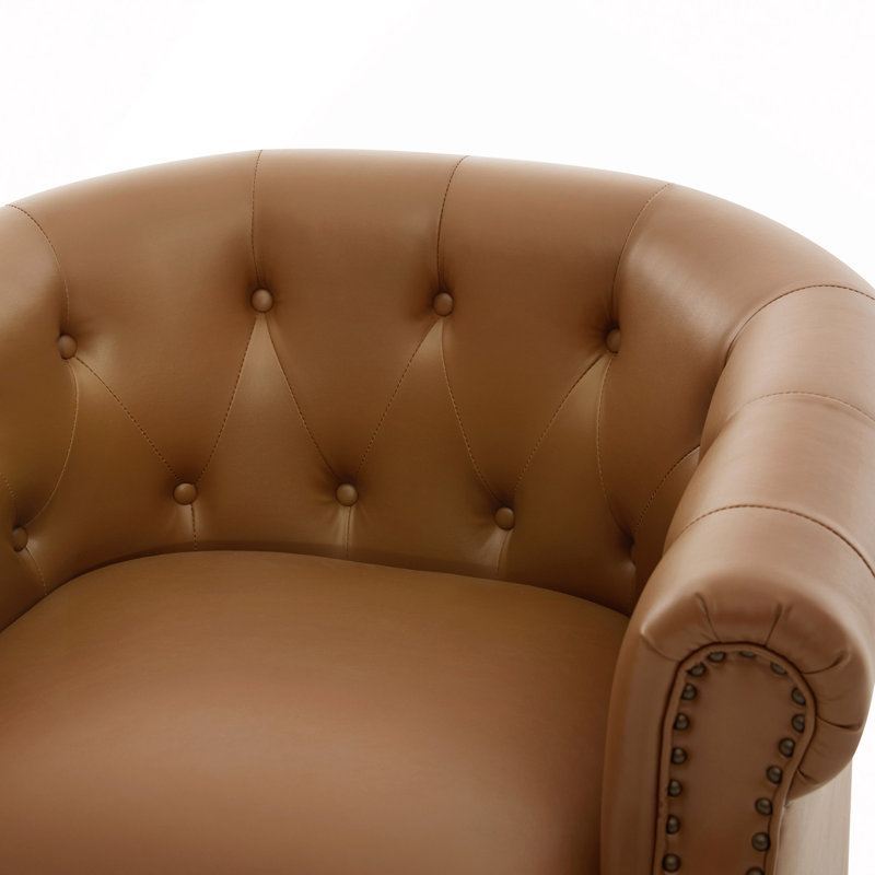 Fauteuil pivotant à 360° en similicuir, avec dossier incurvé, style club, capitonné et base en bois courbé, idéal pour le salon et la chambre.