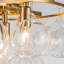 Lustre à niveaux 8 lumières à intensité variable avec boule en verre transparent Yader-102831445