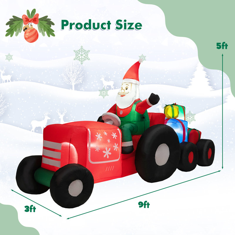 Père Noël conduisant un tracteur gonflable