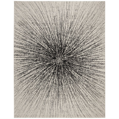 Tapis noir et ivoire à motif abstrait