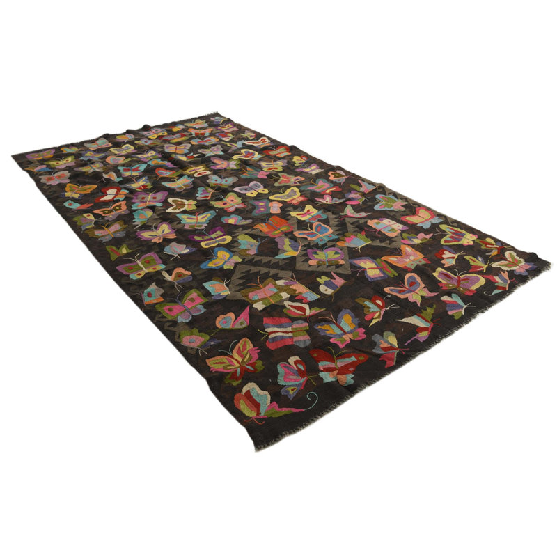 Tapis brun foncé Pelfrey