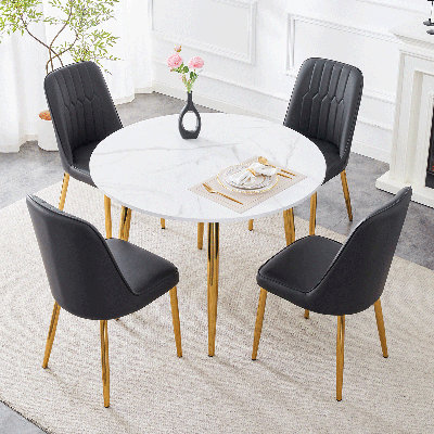 Ensemble de table de salle à manger ronde pour 4 à 6 personnes, table de salle à manger extensible en marbre de 42 po à 54 po avec pieds en métal doré et chaises rembourrées en similicuir, idéale pour les petits appartements.