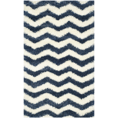 Tapis ivoire / bleu Amhold