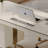 Executive Desk With Two Drawers Keyboard Tray Gold Metal Accents And Built In Outlet?