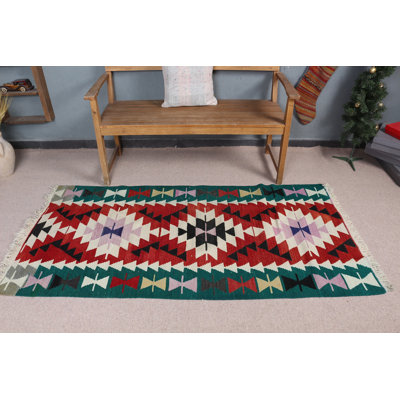 Handwoven Turkish Kilim Rug in Vibrant Red and Green Tones Offering Geometric Patterns for Home Decor