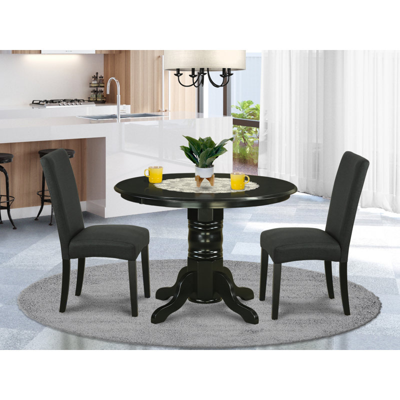L'ensemble 3 pièces de table et chaises de cuisine comprend une table ronde avec piédestal et 2 chaises en tissu de couleur noire, noir