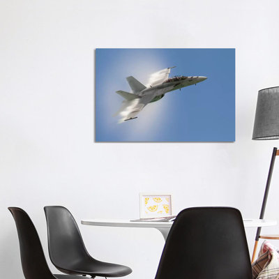 A US Navy F/A-18F Performs A Fast Pass Over Chicago, Illinois by Rob Edgcumbe - Wrapped Canvas Print